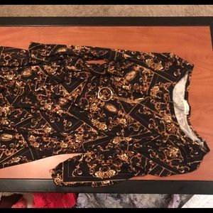 Black and gold long sleeved dress